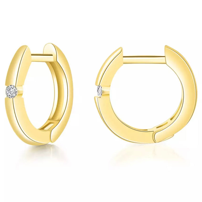 Minimalist huggie hoop earrings in 18K gold plated and sterling silver, perfect for adding a touch of sophistication to any outfit