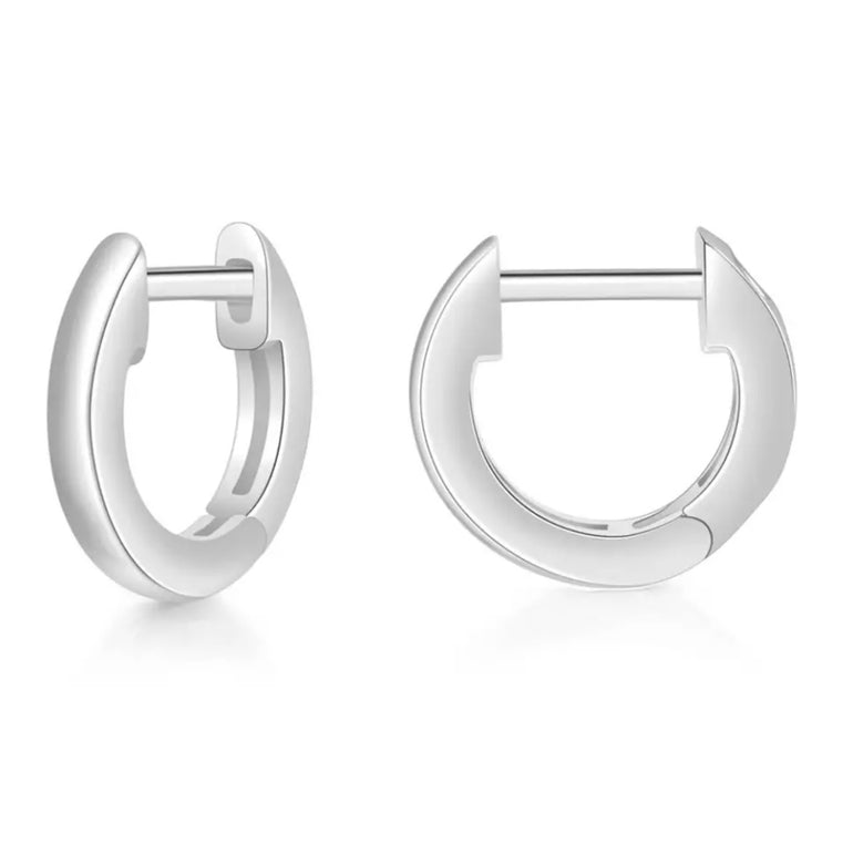 Minimalist huggie hoop earrings in 18K gold plated and sterling silver, perfect for adding a touch of sophistication to any outfit