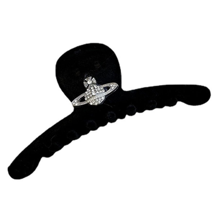Black Velvet Hair Claw Clip sold in Australia, featuring a sleek and elegant design with a luxurious velvet finish and a shiny metal clip for a touch of sophistication
