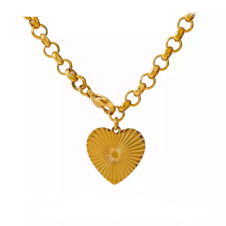 Hammered Heart Pendant with radiant sun rays, water-resistant material, and hammered texture for a chic and stylish look. Ideal for minimalist fans seeking a versatile accessory