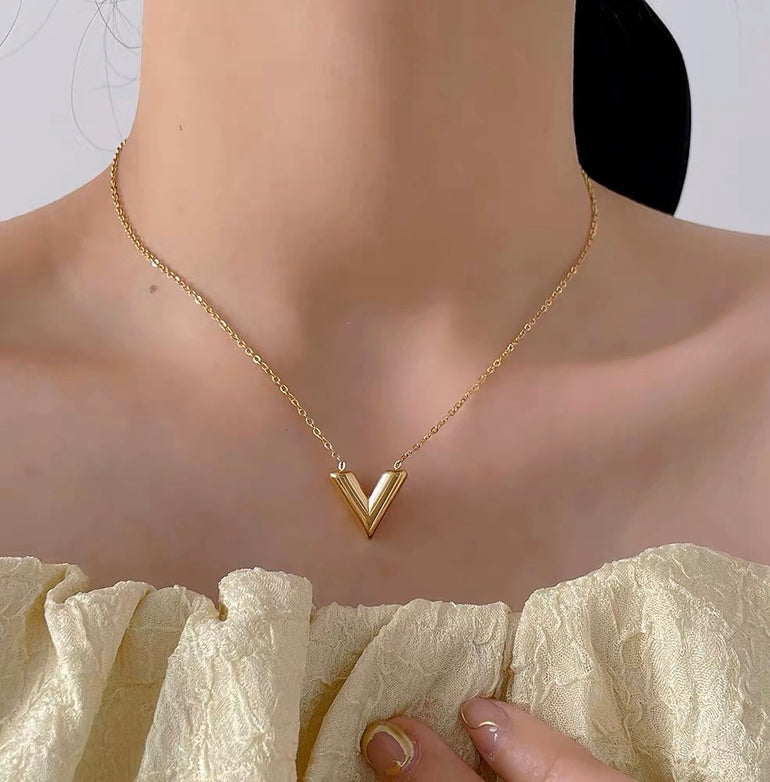 Dainty and minimalist V Shaped pendant necklace in real gold for women in australia.